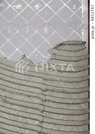 Abstract plaster stucco wall Construction adhesive background te Abstract plaster stucco wall Construction adhesive background te 9852567