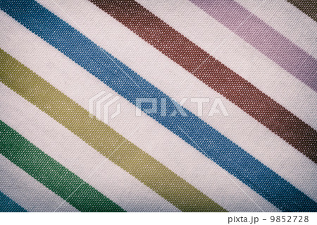 Closeup of colorful striped textile as background or texture 9852728