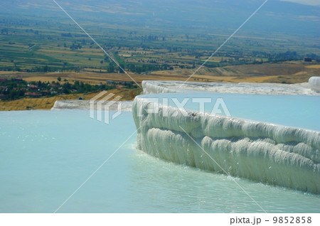 Travertine pools and terraces with water, Pamukkale, Turkey 9852858