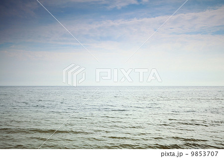 overcast sky above a gray surface of the baltic sea overcast sky above a gray surface of the baltic sea 9853707
