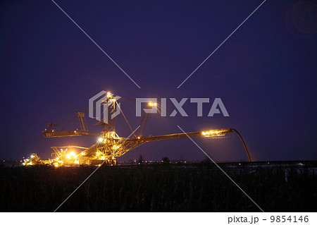 giant excavator in a coal open pit evening 9854146