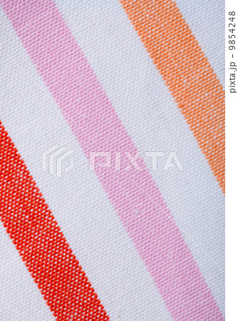 Closeup of colorful striped textile as background or texture Closeup of colorful striped textile as background or texture 9854248