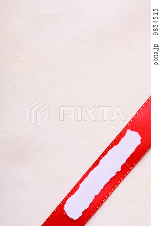 Piece scrap paper blank copy space red ribbon cloth background 9854515