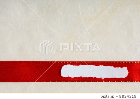 Piece scrap paper blank copy space red ribbon cloth background Piece scrap paper blank copy space red ribbon cloth background 9854519