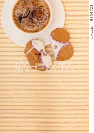 Cup coffee bikini underwear gingerbread cake cookie on bamboo mat Cup coffee bikini underwear gingerbread cake cookie on bamboo mat 9854722