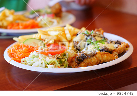 chicken steak with fries / chips and salad 9854745