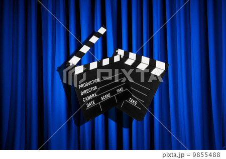 Movie clapper board against curtain Movie clapper board against curtain 9855488