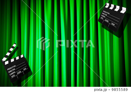 Movie clapper board against curtain 9855589