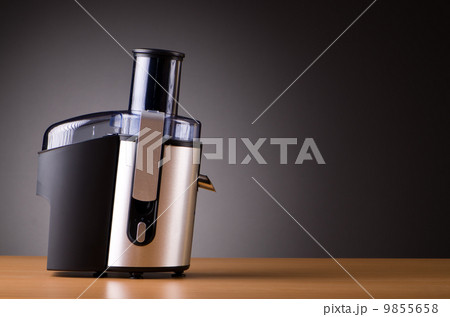 Juice extractor in kitchenware concept Juice extractor in kitchenware concept 9855658