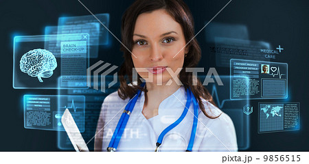 Female medicine doctor working with modern computer interface as Female medicine doctor working with modern computer interface as 9856515