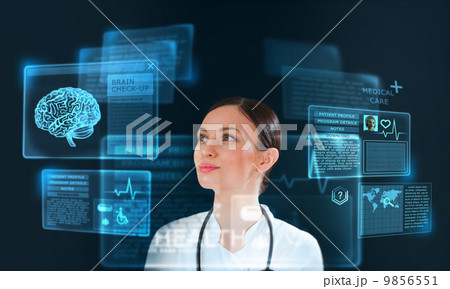 Female medicine doctor working with modern computer interface as Female medicine doctor working with modern computer interface as 9856551