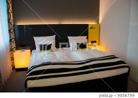Modern interior of the bedroom 9856799