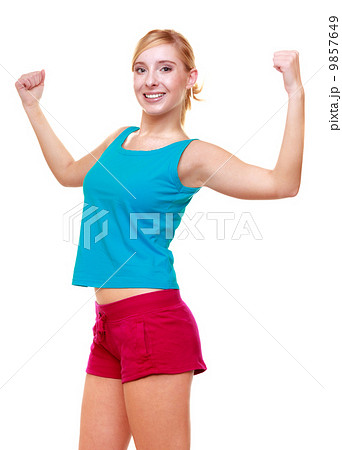 Sport woman fitness girl showing her muscles. Power and energy. Isolated. Sport woman fitness girl showing her muscles. Power and energy. Isolated. 9857649