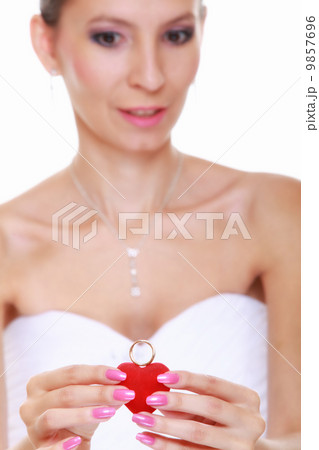 Girl showing engagement or wedding ring, isolated Girl showing engagement or wedding ring, isolated 9857696