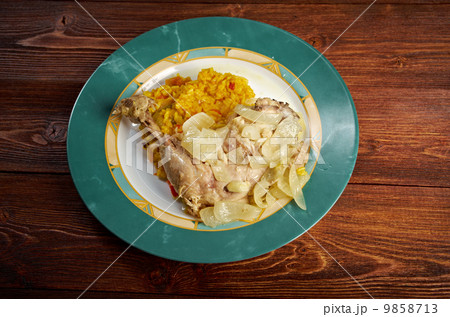 Yassa is a spicy marinated Yassa is a spicy marinated 9858713