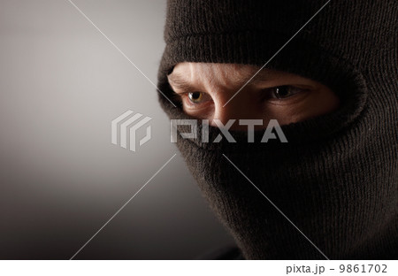 aggressive man in the mask 9861702