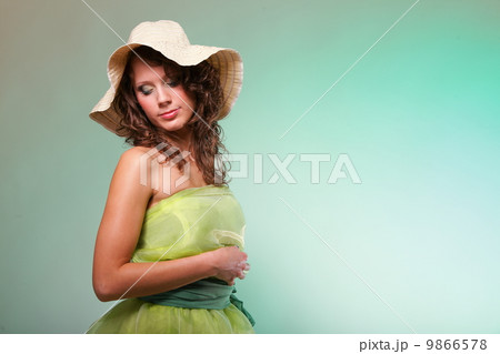 Beautiful spring woman portrait. Green concept 9866578