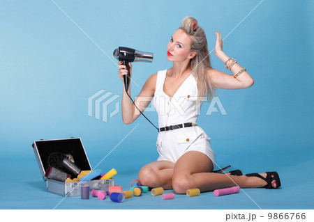 pin up girl retro style portrait woman drying hair pin up girl retro style portrait woman drying hair 9866766