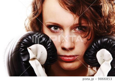 Fit woman boxing - isolated over white Fit woman boxing - isolated over white 9866853
