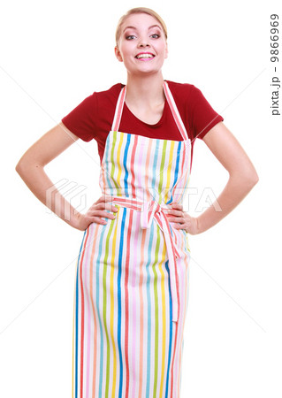 Young housewife or barista wearing kitchen apron isolated 9866969