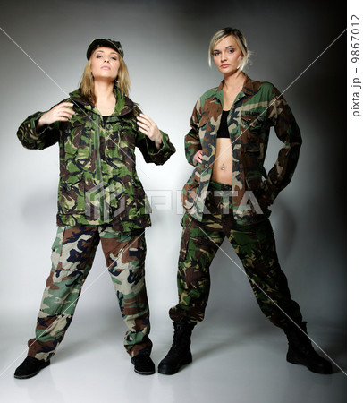 Two women in military clothes, army girls Two women in military clothes, army girls 9867012
