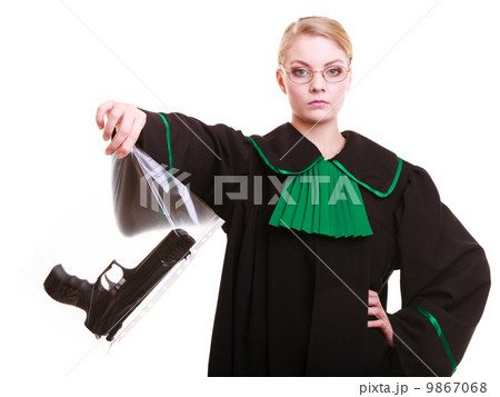 Woman lawyer holds bag with gun marked evidence of crime 9867068