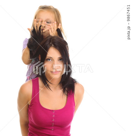 Happy family mother playing with her daughter Happy family mother playing with her daughter 9867451