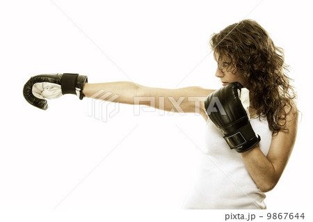 Fit woman boxing - isolated over white Fit woman boxing - isolated over white 9867644