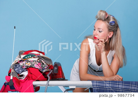 pin up girl retro style portrait woman ironing 9867734