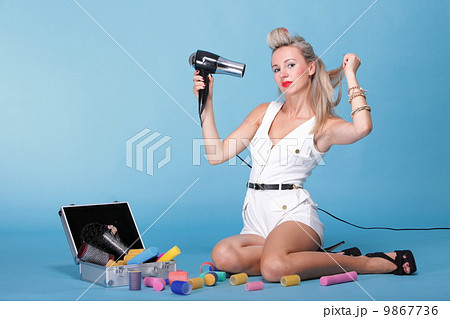 pin up girl retro style portrait woman drying hair pin up girl retro style portrait woman drying hair 9867736