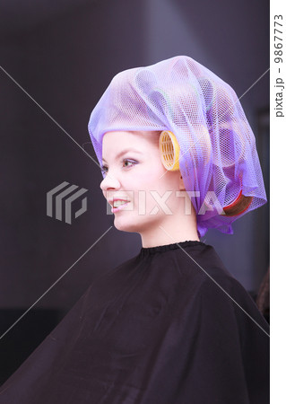 Beautiful blond girl hair curlers rollers hairdresser beauty salon Beautiful blond girl hair curlers rollers hairdresser beauty salon 9867773