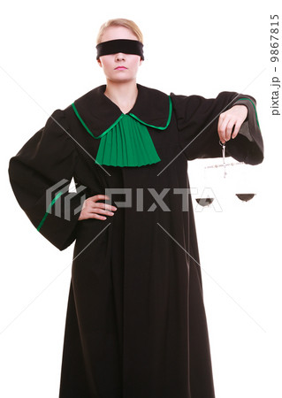 female lawyer attorney in classic polish black green gown and scales female lawyer attorney in classic polish black green gown and scales 9867815