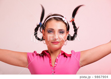 picture of surprised woman hair in pigtail 9867904