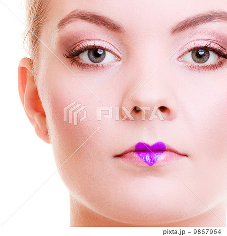 Portrait of beautiful blond girl woman with heart love symbol on lips Portrait of beautiful blond girl woman with heart love symbol on lips 9867964