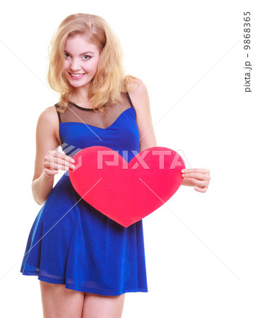Red heart. Love symbol. Woman hold Valentine day symbol. 9868365