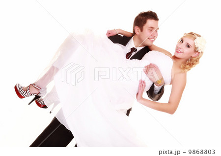 Portrait of happy bride and groom on white background 9868803