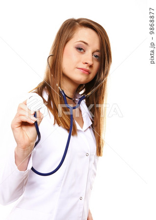 Female doctor or nurse holding stethoscope. Female doctor or nurse holding stethoscope. 9868877