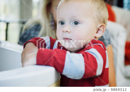 Portrait of little pensive baby boy indoor Portrait of little pensive baby boy indoor 9869312