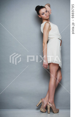 Fashion photo of young woman. Girl posing. Studio photo Fashion photo of young woman. Girl posing. Studio photo 9869795