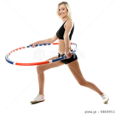 young fitness woman with hula hoop isolated young fitness woman with hula hoop isolated 9869951