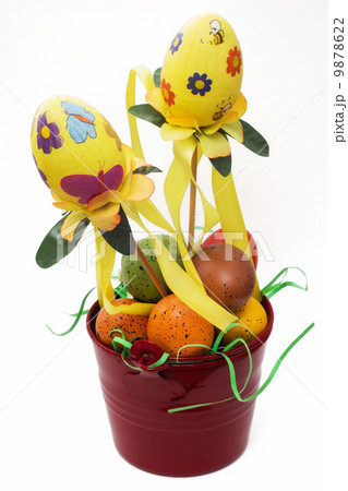 Red bucket with painted easter eggs 9878622