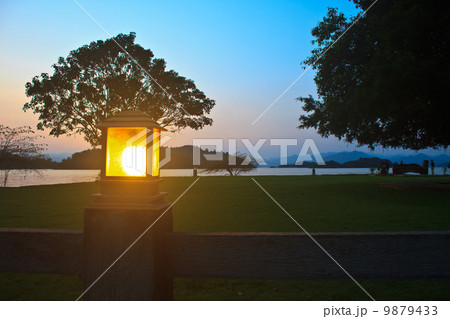 lighting pole and sunset at camping ground 9879433