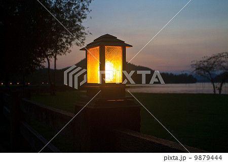 lighting pole and sunset at camping ground 9879444