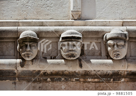 Stone heads at Cathedral of St. James in Sibenik, Croatia 9881505