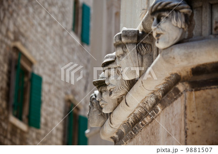 Stone heads at Cathedral of St. James in Sibenik, Croatia Stone heads at Cathedral of St. James in Sibenik, Croatia 9881507
