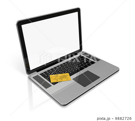 gold credit card on laptop 9882726