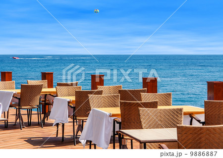Restaurant on terrace with sea view in Kemer, Turkey. Restaurant on terrace with sea view in Kemer, Turkey. 9886887