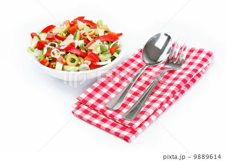 Healthy food. Fresh vegetable salad on a white background. Healthy food. Fresh vegetable salad on a white background. 9889614