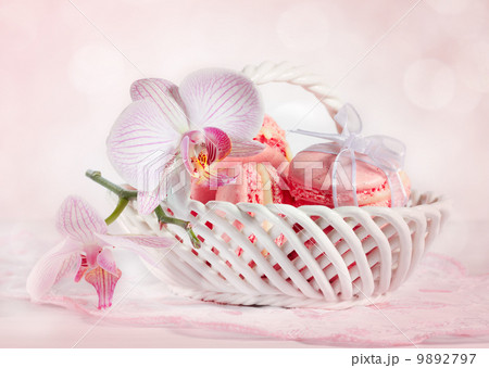 French macarons with orchid on pink background background. 9892797