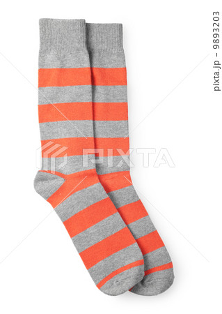 two striped orange and gray socks isolated on white background two striped orange and gray socks isolated on white background 9893203